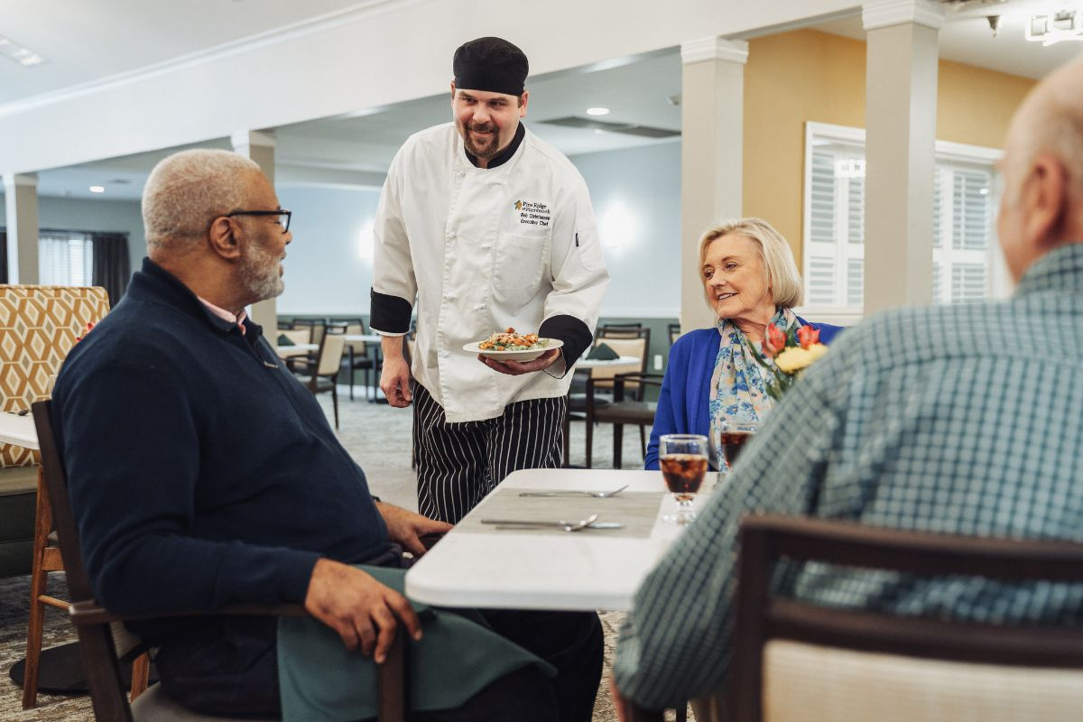 true connection residents and chef with prepared meals