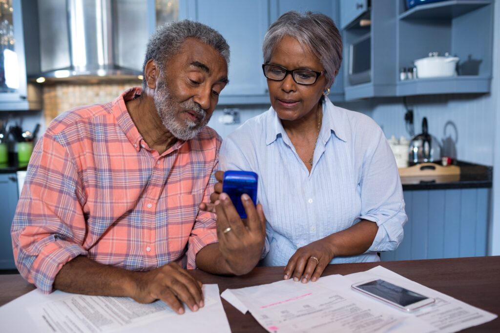 Retirement communities couple looking over financials true connection communities